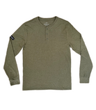 An olive green long-sleeved henley shirt laid flat. It has a round neckline with a few buttons at the top. The shirt appears to be made of a soft, heathered fabric and has The Lomas Brand name visible near the neckline with a patch on the right sleeve.​​​​​​​​​