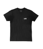 Soft black t-shirt with a white logo on upper left chest featuring "The Lomas Brand" text below an image of a stylized cactus, a soaring bird silhouette, and rising sun.