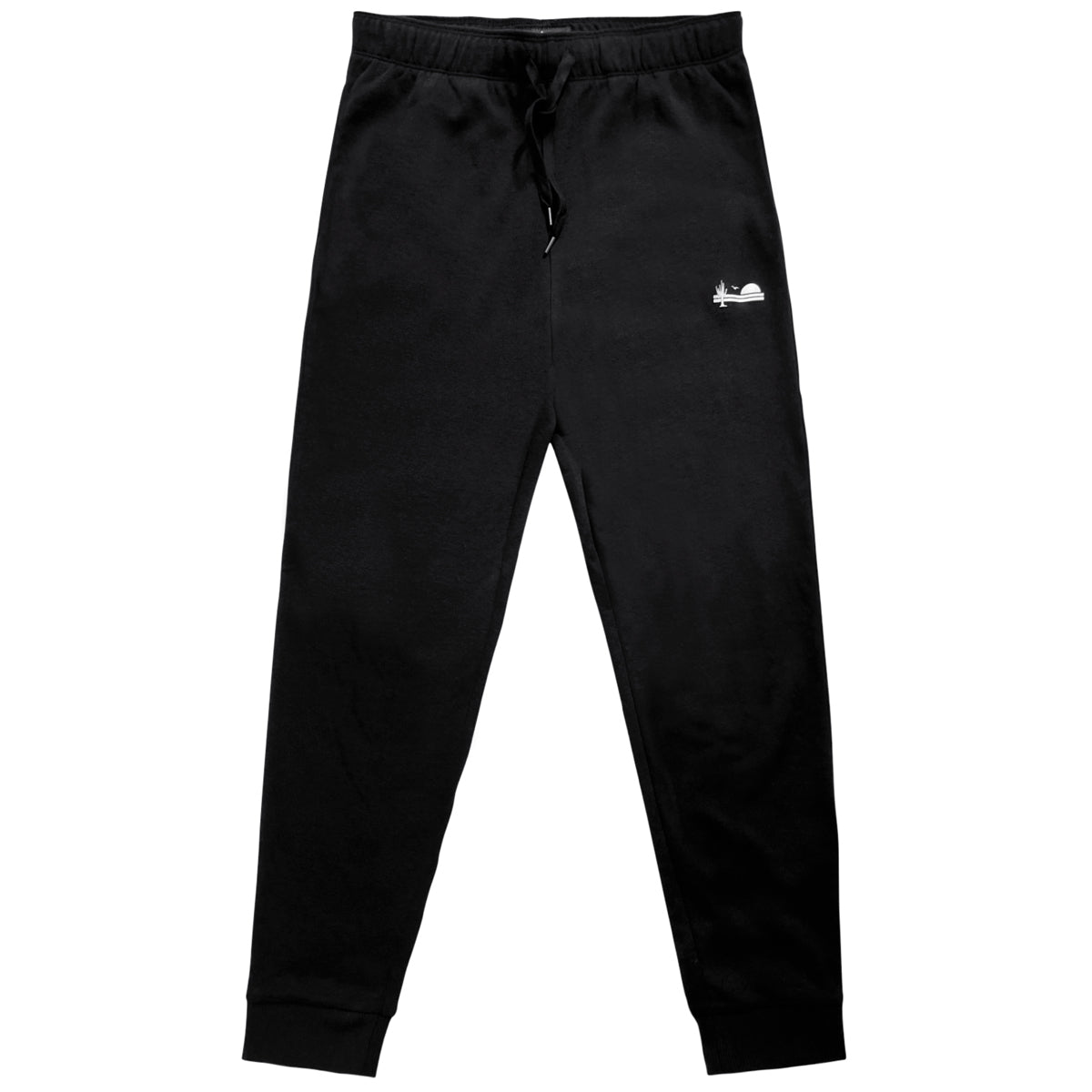 Flat shot of a pair of black sweatpants joggers. The joggers feature a white icon on the upper left thigh, with a cactus, a bird, and a rising sun. 