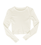 Flat photo of a yellow white long sleeve crop top t-shirt. The shirt has a small logo on the upper left chest with a cactus, a bird, and a rising sun. 