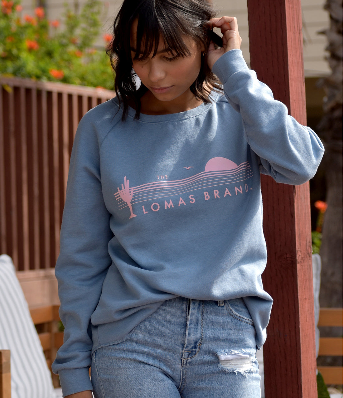 This seasons new take on the scoop neck pullover featuring our desert coast sunset logo in faint pink for a 90's retro type of style. Effortlessly pair with any jeans or leggings while snuggling in to this pullover's super soft, push fleece lining.     