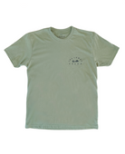 A light army green t-shirt with a small logo on the chest that reads "THE LOMAS BRAND" around a saguaro cactus, bird, and rising sun. 