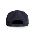 The back of a navy snapback hat on a white background. 